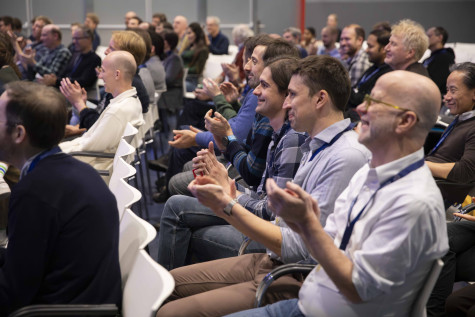 visitors clapping for presenters