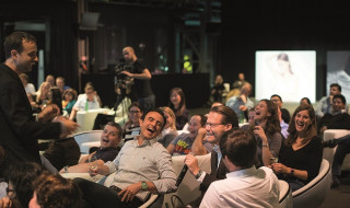 Boom Chicago show people laughing in audience
