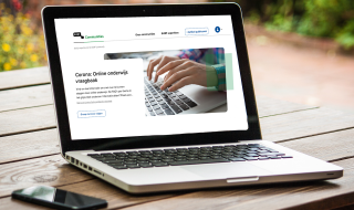 laptop met afbeelding homepage Vraagbaak Online Oderwijs