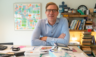 Derk Loorbach behind his desk